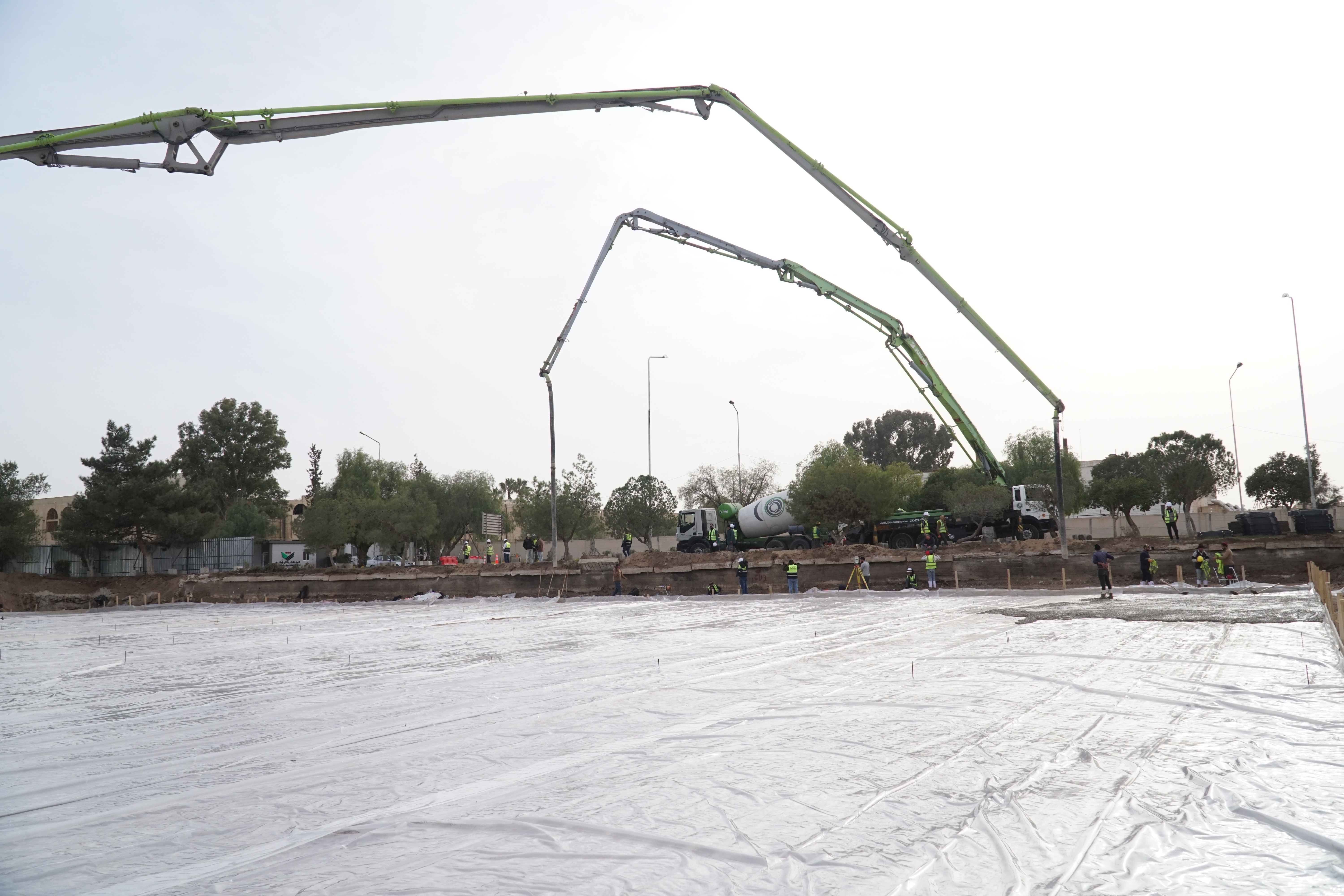 Concrete truck and pumping system in deep excavation